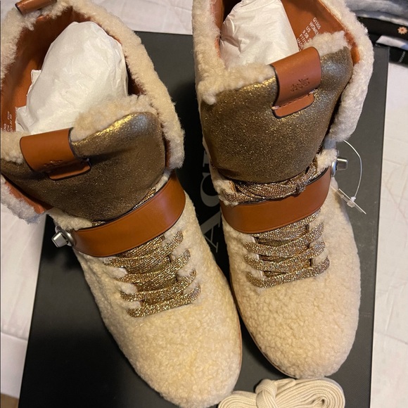 Brand new coach boots size 9 1/2